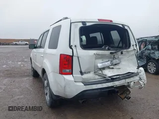2013 Honda Pilot EX-L with VIN 5FNYF3H52DB014959, listed as a IAAI auction lot 41459164 with 174,136 mi miles and . Bid and sale history available at DreamBid. Image 3.