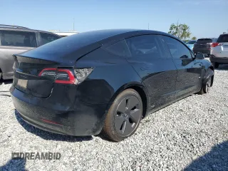 2022 Tesla Model 3 with VIN 5YJ3E1EA1NF374390, listed as a Copart auction lot 52709455 with 44,212 mi miles and Non Repairable. Bid and sale history available at carsss.com. Image 3.