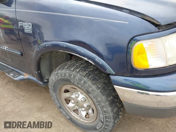 2002 Ford F-150 XL with VIN 2FTPX18L32CA67220, listed as a IAAI auction lot 42077154 with 233,409 mi miles. Bid and sale history available at carsss.com. Image 6.