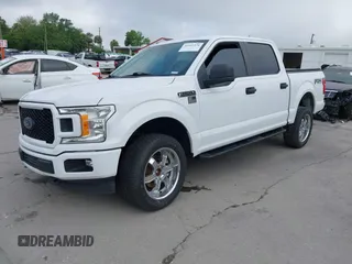 2018 Ford F-150 XL with VIN 1FTEW1E54JFB51565, listed as a IAAI auction lot 41942276 with 131,864 mi miles. Bid and sale history available at carsss.com. Image 2.