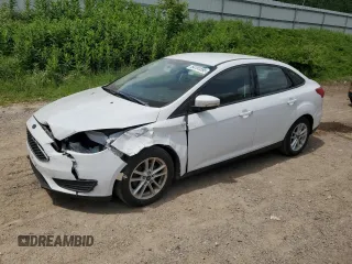 2018 Ford Focus SE z VIN 1FADP3F27JL321207, wystawiony jako Copart lot #64191595 z przebiegiem 76 402 mil mil oraz Czysty tytuł • Clean title. Historia ofert i sprzedaży dostępna na DreamBid. Obrazek 1.
