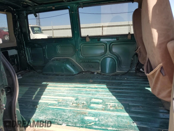 1998 GMC Safari z VIN 1GKEL19W6WB525088, wystawiony jako Copart lot #67982664 z przebiegiem 163 182 mil mil oraz Szkody całkowita. Historia ofert i sprzedaży dostępna na DreamBid. Obrazek 11.