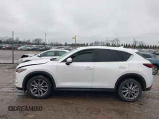 2021 Mazda CX-5 Grand Touring with VIN JM3KFADM4M1340141, listed as a IAAI auction lot 41194711 with 37,887 mi miles. Bid and sale history available at carsss.com. Image 14.