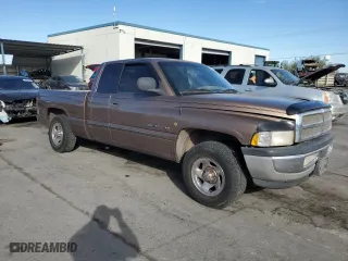 2000 Dodge Ram 1500 with VIN 3B7HC13Z8YM241128, listed as a Copart auction lot 76496774 with 125,929 mi miles and Salvage Title. Bid and sale history available at carsss.com. Image 4.