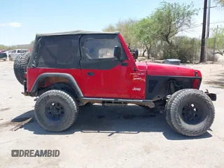 2000 Jeep Wrangler Sport with VIN 1J4FA49S0YP731544, listed as a IAAI auction lot 42570831 with Not provided miles and . Bid and sale history available at DreamBid. Image 14.