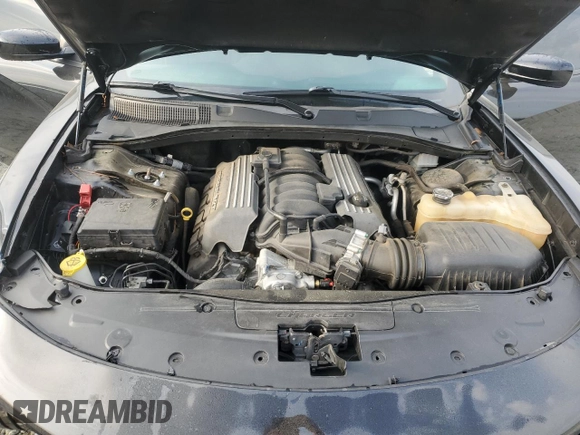 2019 Dodge Charger Scat Pack z VIN 2C3CDXGJ7KH697176, wystawiony jako Copart lot #53702845 z przebiegiem 76 988 mil mil oraz Szkoda całkowita • Salvage title. Historia ofert i sprzedaży dostępna na DreamBid. Obrazek 11.
