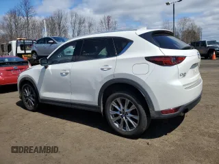 2020 Mazda CX-5 Grand Touring with VIN JM3KFBDM9L1803881, listed as a Copart auction lot 52822395 with 49,604 mi miles and Salvage Title. Bid and sale history available at carsss.com. Image 2.