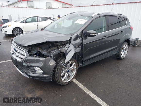 2019 Ford Escape Titanium with VIN 1FMCU9J99KUA64158, listed as a IAAI auction lot 41980102 with 52,514 mi miles. Bid and sale history available at carsss.com. Image 18.
