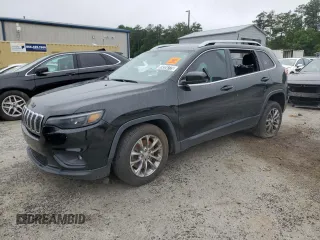2019 Jeep Cherokee Latitude Plus z VIN 1C4PJLLBXKD403277, wystawiony jako Copart lot #59334775 z przebiegiem 105 652 mil mil oraz Czysty tytuł • Clean title. Historia ofert i sprzedaży dostępna na DreamBid. Obrazek 1.