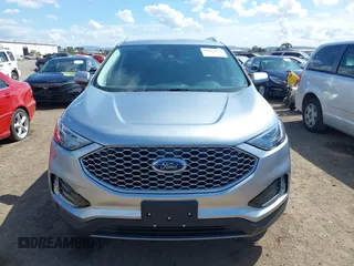 2024 Ford Edge SEL z VIN 2FMPK4J9XRBA43703, wystawiony jako IAAI lot #42064393 z przebiegiem 15 522 mil mil oraz . Historia ofert i sprzedaży dostępna na DreamBid. Obrazek 13.