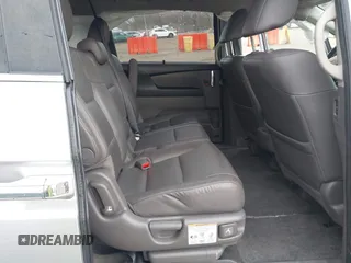 2014 Honda Odyssey EX-L with VIN 5FNRL5H65EB096544, listed as a IAAI auction lot 41903451 with 99,628 mi miles and . Bid and sale history available at carsss.com. Image 8.