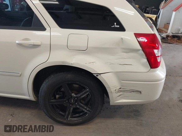 2006 Dodge Magnum z VIN 2D8GZ57286H100782, wystawiony jako IAAI lot #41816780 z przebiegiem 203 839 mil mil oraz . Historia ofert i sprzedaży dostępna na DreamBid. Obrazek 6.