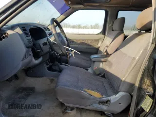 2000 Nissan Frontier XE z VIN 1N6ED27Y2YC369211, wystawiony jako Copart lot #80594884 z przebiegiem 225 194 mil mil oraz Czysty tytuł • Clean title. Historia ofert i sprzedaży dostępna na DreamBid. Obrazek 7.