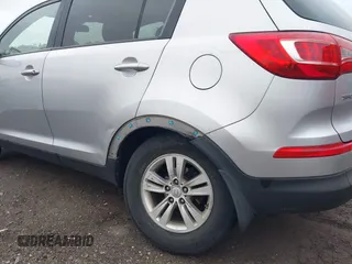 2011 Kia Sportage LX z VIN KNDPB3A24B7099054, wystawiony jako IAAI lot #42358614 z przebiegiem 211 143 mil mil oraz . Historia ofert i sprzedaży dostępna na DreamBid. Obrazek 6.