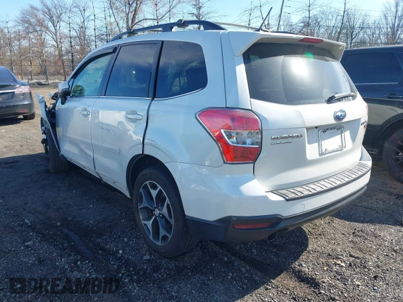 2014 Subaru Forester XT Touring with VIN JF2SJGMC4EH534647, listed as a IAAI auction lot 41828950 with 106,375 mi miles and . Bid and sale history available at DreamBid. Image 3.