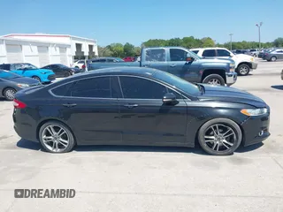 2014 Ford Fusion Titanium with VIN 3FA6P0K9XER216551, listed as a IAAI auction lot 42037004 with 113,857 mi miles and . Bid and sale history available at DreamBid. Image 13.
