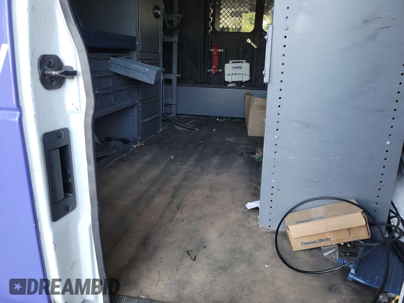 2012 Ford Econoline Cargo Commercial with VIN 1FTNE2EL9CDB21032, listed as a IAAI auction lot 42787135 with 106,406 mi miles and . Bid and sale history available at DreamBid. Image 16.