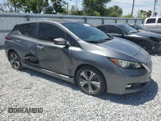 2018 Nissan LEAF S with VIN 1N4AZ1CP2JC301612, listed as a Copart auction lot 52483345 with 99,276 mi miles and Non Repairable. Bid and sale history available at DreamBid. Image 4.