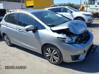 2017 Honda Fit EX z VIN 3HGGK5G71HM704887, wystawiony jako IAAI lot #42063594 z przebiegiem 82 291 mil mil oraz . Historia ofert i sprzedaży dostępna na DreamBid. Obrazek 1.