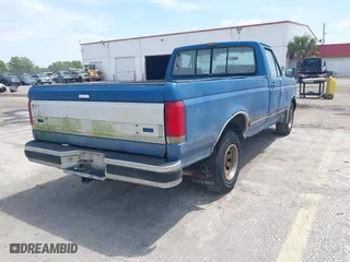 1990 Ford 1/2 Ton Trucks with VIN 1FTEF15Y3LLB01819, listed as a IAAI auction lot 42116130 with 505,103 mi miles. Bid and sale history available at carsss.com. Image 4.
