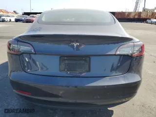2022 Tesla Model 3 with VIN 5YJ3E1EA1NF372879, listed as a Copart auction lot 71604604 with 60,925 mi miles and Salvage Title. Bid and sale history available at carsss.com. Image 6.