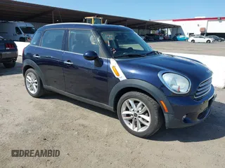 2014 MINI Countryman with VIN WMWZB3C52EWR36682, listed as a IAAI auction lot 41977634 with 57,662 mi miles and . Bid and sale history available at DreamBid. Image 1.