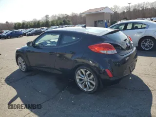 2013 Hyundai Veloster w/Black Int z VIN KMHTC6AD5DU173029, wystawiony jako Copart lot #52587455 z przebiegiem 161 716 mil mil oraz Czysty tytuł • Clean title. Historia ofert i sprzedaży dostępna na DreamBid. Obrazek 2.