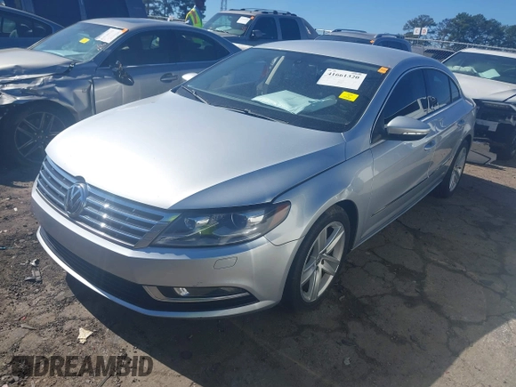 2013 Volkswagen CC Sport with VIN WVWBN7AN3DE553523, listed as a IAAI auction lot 41661320 with 95,085 mi miles and . Bid and sale history available at DreamBid. Image 2.