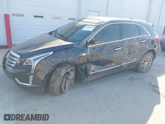 2017 Cadillac XT5 Luxury FWD with VIN 1GYKNBRS0HZ105603, listed as a IAAI auction lot 41786673 with 75,482 mi miles. Bid and sale history available at carsss.com. Image 17.