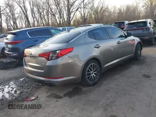 2013 Kia Optima LX with VIN 5XXGM4A77DG166140, listed as a IAAI auction lot 41881144 with 185,391 mi miles. Bid and sale history available at carsss.com. Image 4.