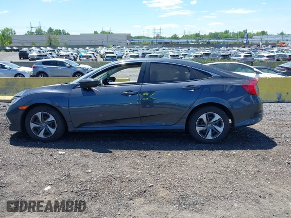 2020 Honda Civic LX z VIN 2HGFC2F61LH567246, wystawiony jako IAAI lot #42290361 z przebiegiem 50 388 mil mil oraz . Historia ofert i sprzedaży dostępna na DreamBid. Obrazek 14.