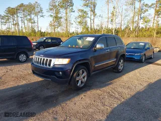 2012 Jeep Grand Cherokee Limited with VIN 1C4RJFBG4CC189210, listed as a IAAI auction lot 41837118 with 155,050 mi miles. Bid and sale history available at carsss.com. Image 17.