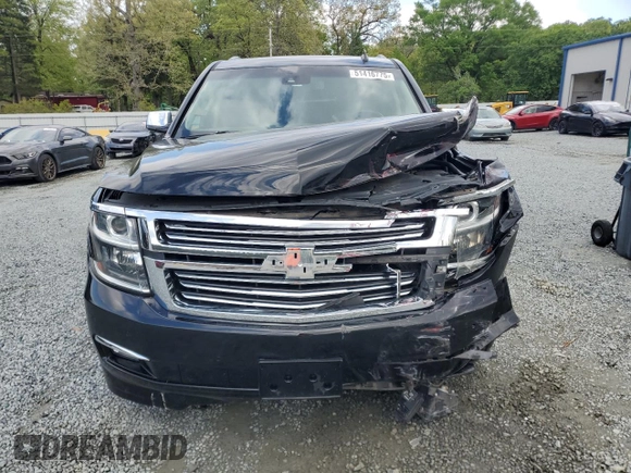 2015 Chevrolet Suburban LTZ with VIN 1GNSKKKC4FR119803, listed as a Copart auction lot 51416775 with 135,366 mi miles and Salvage Title. Bid and sale history available at DreamBid. Image 5.