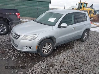 2011 Volkswagen Tiguan SEL with VIN WVGBV7AX5BW502741, listed as a IAAI auction lot 41441949 with 106,700 mi miles and . Bid and sale history available at DreamBid. Image 2.