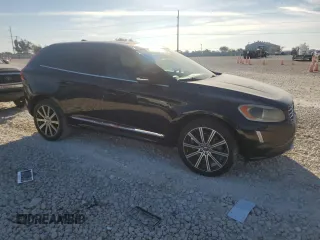 2015 Volvo XC60 T5 Drive-E Platinum с VIN YV440MDD9F2626016, выставлен на аукционе Copart как лот 82492164 с пробегом 167 072 миль миль и Чистый • Clean title. История ставок и продаж доступна на DreamBid. Изображение 4.