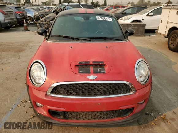 2012 MINI Coupe S z VIN WMWSX3C57CT155013, wystawiony jako Copart lot #88066275 z przebiegiem 69 870 mil mil oraz Szkody całkowita. Historia ofert i sprzedaży dostępna na DreamBid. Obrazek 5.