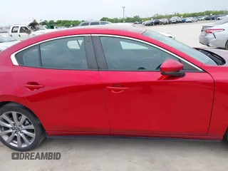 2022 Mazda 3 Select z VIN 3MZBPABL9NM316998, wystawiony jako IAAI lot #42117951 z przebiegiem 44 594 mil mil oraz . Historia ofert i sprzedaży dostępna na DreamBid. Obrazek 13.
