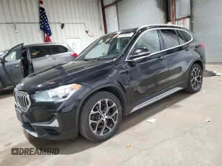 2020 BMW X1 xDrive28i with VIN WBXJG9C01L5P75983, listed as a Copart auction lot 49652065 with 80,969 mi miles and Clean Title. Bid and sale history available at carsss.com. Image 1.