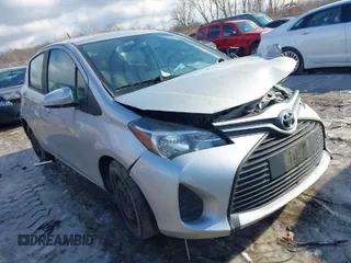 2015 Toyota Yaris L with VIN VNKKTUD38FA029753, listed as a IAAI auction lot 41561398 with 57,775 mi miles. Bid and sale history available at carsss.com. Image 1.