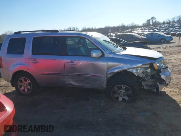 2009 Honda Pilot Touring with VIN 5FNYF48979B008851, listed as a IAAI auction lot 41252736 with 183,292 mi miles and . Bid and sale history available at carsss.com. Image 13.