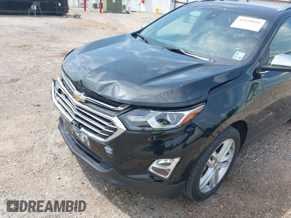 2021 Chevrolet Equinox Premier with VIN 2GNAXNEV5M6151910, listed as a IAAI auction lot 42110010 with 45,911 mi miles and . Bid and sale history available at DreamBid. Image 18.