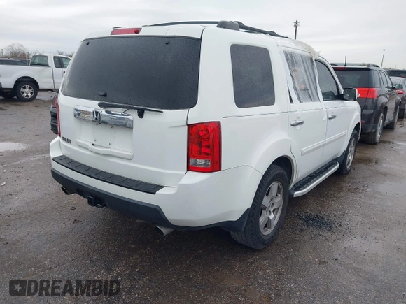 2011 Honda Pilot EX-L with VIN 5FNYF3H67BB014641, listed as a IAAI auction lot 41276698 with 193,656 mi miles and . Bid and sale history available at DreamBid. Image 4.