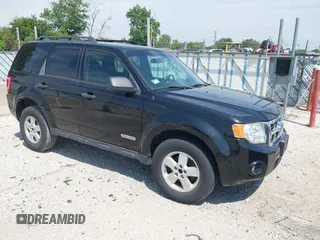 2008 Ford Escape XLT with VIN 1FMCU03Z08KE76076, listed as a IAAI auction lot 42709395 with 129,203 mi miles and . Bid and sale history available at DreamBid. Image 1.