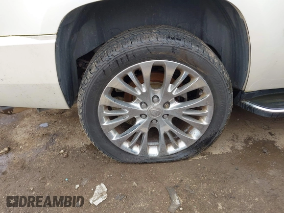 2007 Cadillac Escalade z VIN 1GYFK63837R304030, wystawiony jako IAAI lot #42198618 z przebiegiem 202 093 mil mil oraz . Historia ofert i sprzedaży dostępna na DreamBid. Obrazek 12.