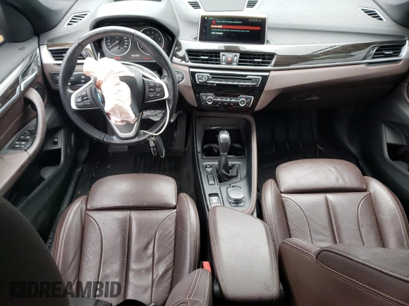 2018 BMW X1 xDrive28i with VIN WBXHT3C35J5F88893, listed as a Copart auction lot 58032725 with 143,968 mi miles and Salvage title. Bid and sale history available at DreamBid. Image 8.