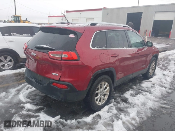 2014 Jeep Cherokee Latitude with VIN 1C4PJMCB8EW166853, listed as a IAAI auction lot 41579386 with 251,683 mi miles and . Bid and sale history available at DreamBid. Image 4.