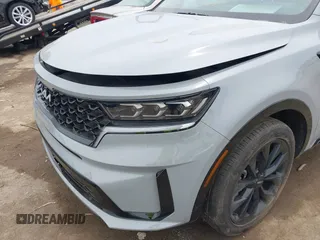 2023 Kia Sorento SX z VIN 5XYRKDLF0PG227203, wystawiony jako IAAI lot #42269412 z przebiegiem 22 641 mil mil oraz . Historia ofert i sprzedaży dostępna na DreamBid. Obrazek 21.