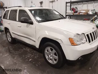 2010 Jeep Grand Cherokee Laredo with VIN 1J4PR4GK1AC143486, listed as a IAAI auction lot 41761763 with 159,139 mi miles. Bid and sale history available at carsss.com. Image 6.