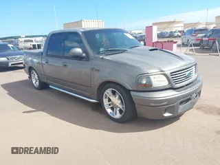 2002 Ford F-150 Harley Davidson with VIN 1FTRW07312KC88379, listed as a IAAI auction lot 41657219 with 1 mi miles. Bid and sale history available at carsss.com. Image 1.