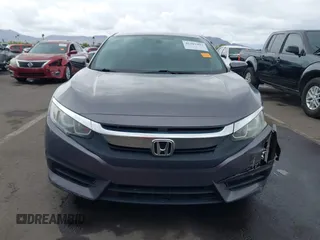 2017 Honda Civic LX with VIN 19XFC2F50HE055888, listed as a IAAI auction lot 42202494 with 147,354 mi miles and . Bid and sale history available at DreamBid. Image 12.